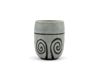 Handcrafted Mino-yaki Yunomi Japanese teacup with traditional glaze, perfect for daily tea rituals.