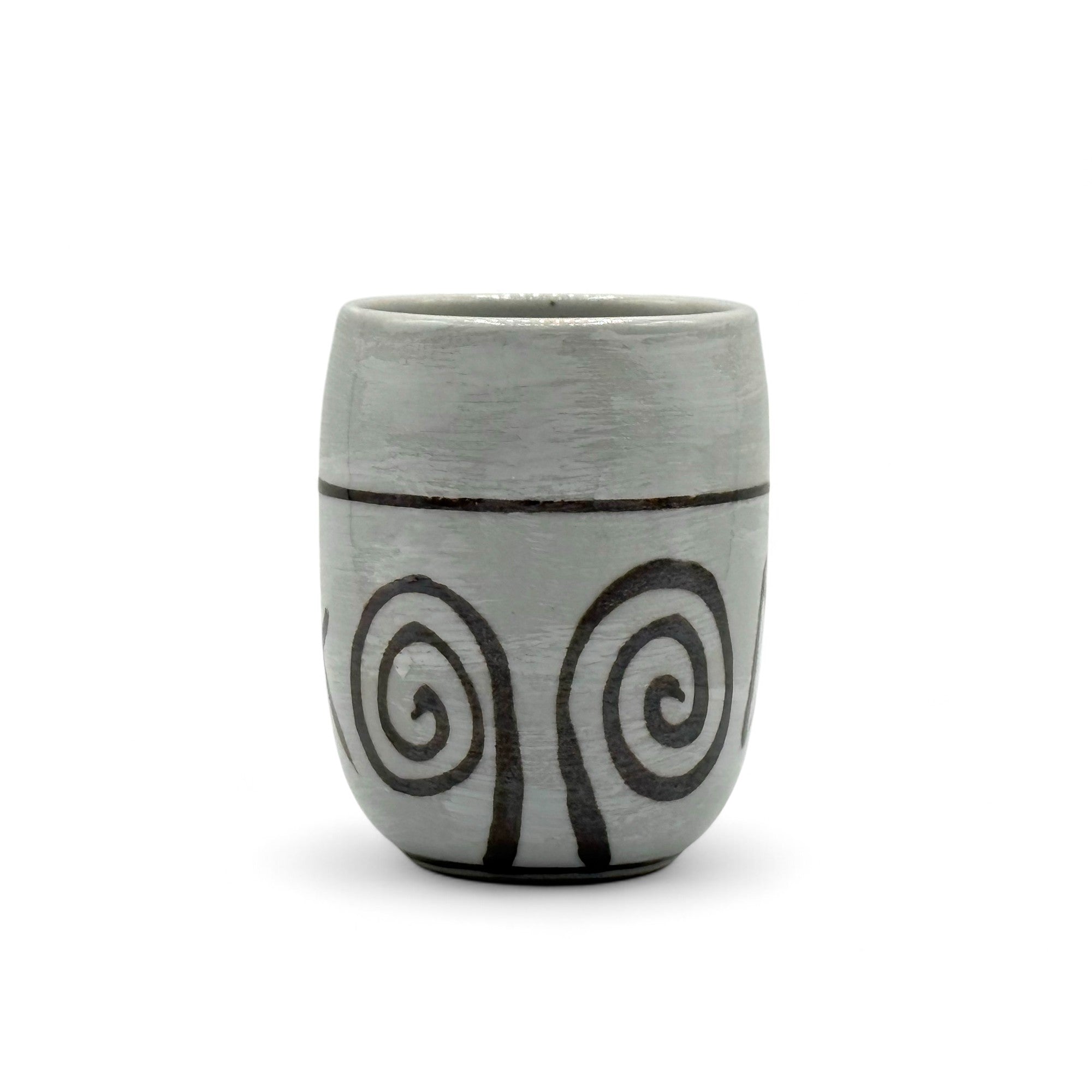 Handcrafted Mino-yaki Yunomi Japanese teacup with traditional glaze, perfect for daily tea rituals.