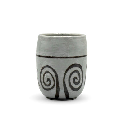 Handcrafted Mino-yaki Yunomi Japanese teacup with traditional glaze, perfect for daily tea rituals.