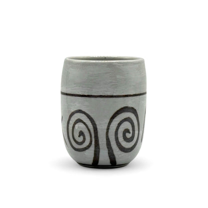 Handcrafted Mino-yaki Yunomi Japanese teacup with traditional glaze, perfect for daily tea rituals.
