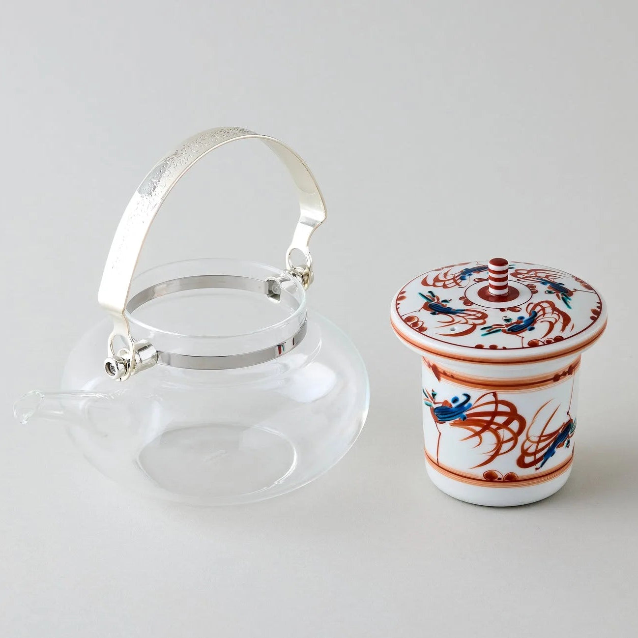 Shuchō Kutani glass teapot with red Akae bird motif, elegant Japanese tea kettle for tea lovers.