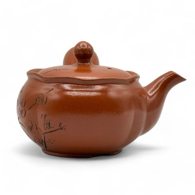 Shuiro red Tokoname-yaki Kyusu Japanese teapot handcrafted in Japan for authentic loose-leaf tea brewing.