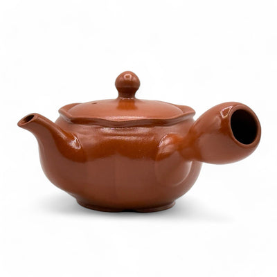 Shuiro red Tokoname-yaki Kyusu Japanese teapot handcrafted in Japan for authentic loose-leaf tea brewing.