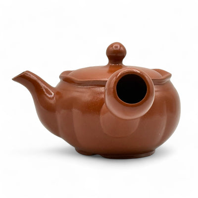 Shuiro red Tokoname-yaki Kyusu Japanese teapot handcrafted in Japan for authentic loose-leaf tea brewing.