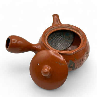 Shuiro red Tokoname-yaki Kyusu Japanese teapot handcrafted in Japan for authentic loose-leaf tea brewing.