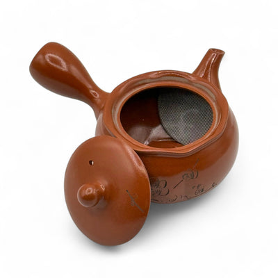 Shuiro red Tokoname-yaki Kyusu Japanese teapot handcrafted in Japan for authentic loose-leaf tea brewing.