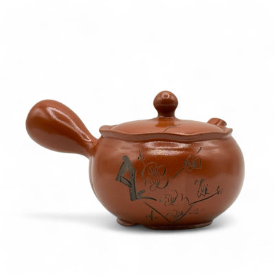 Shuiro red Tokoname-yaki Kyusu Japanese teapot handcrafted in Japan for authentic loose-leaf tea brewing.