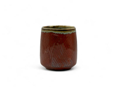 Handcrafted Mino-yaki Yunomi Japanese teacup with traditional glaze, perfect for daily tea rituals.