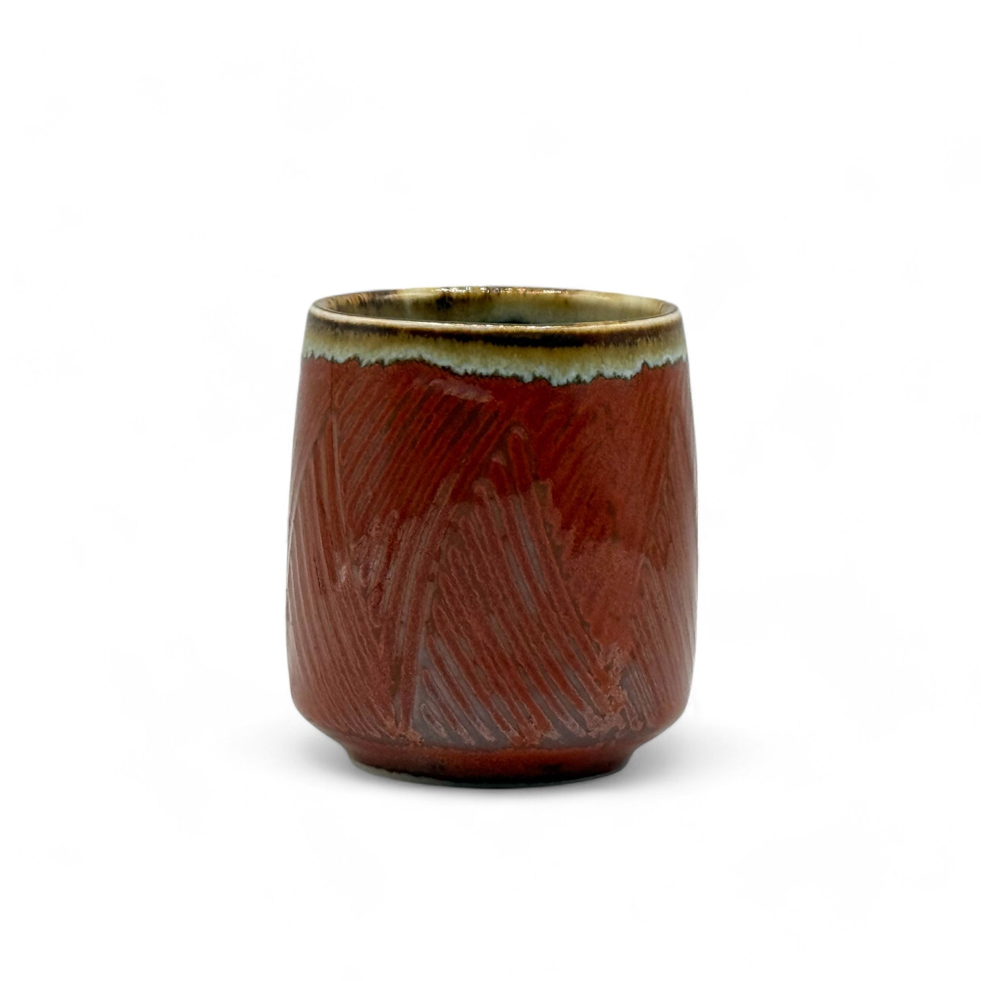 Handcrafted Mino-yaki Yunomi Japanese teacup with traditional glaze, perfect for daily tea rituals.