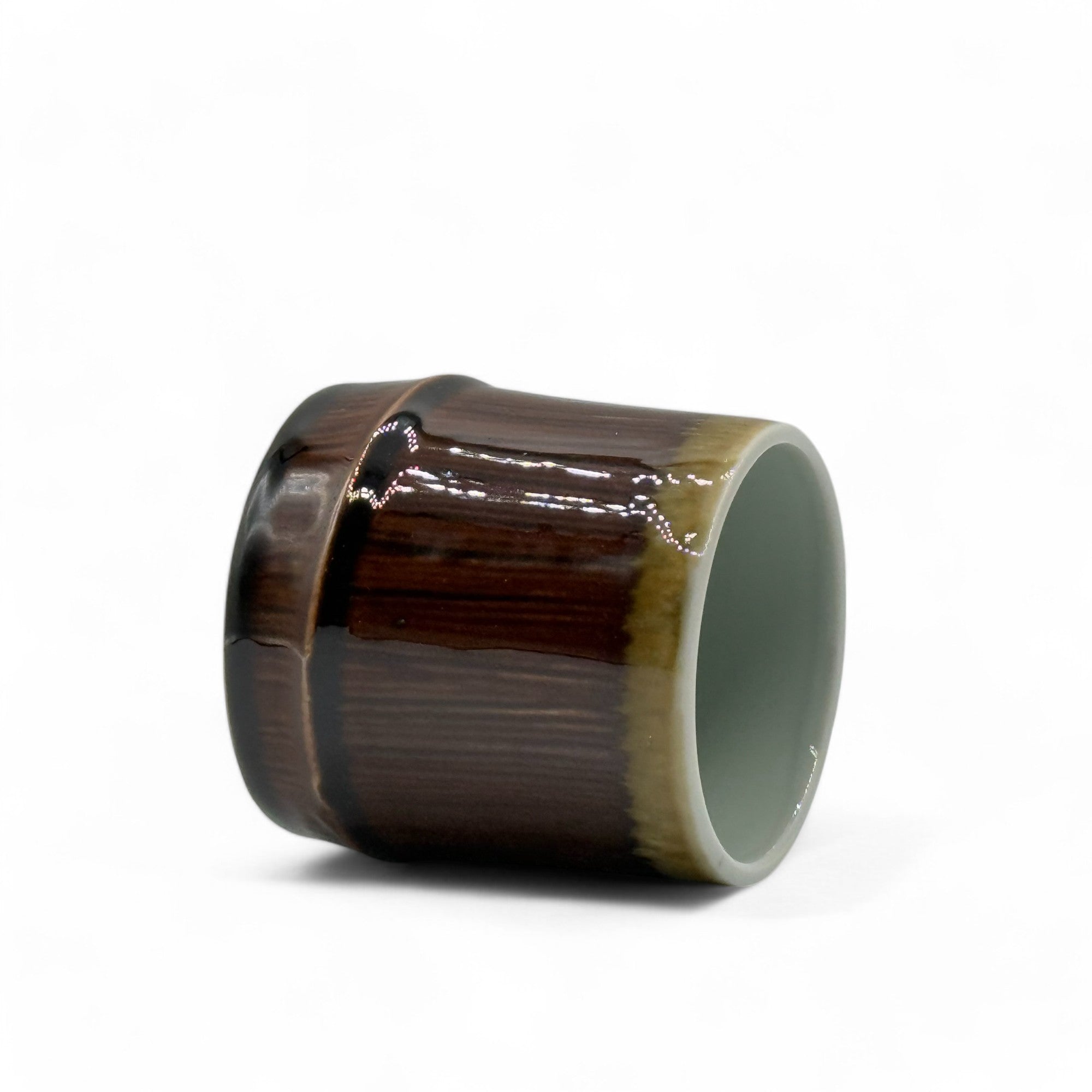 Handcrafted Mino-yaki Yunomi Japanese teacup with traditional glaze, perfect for daily tea rituals.