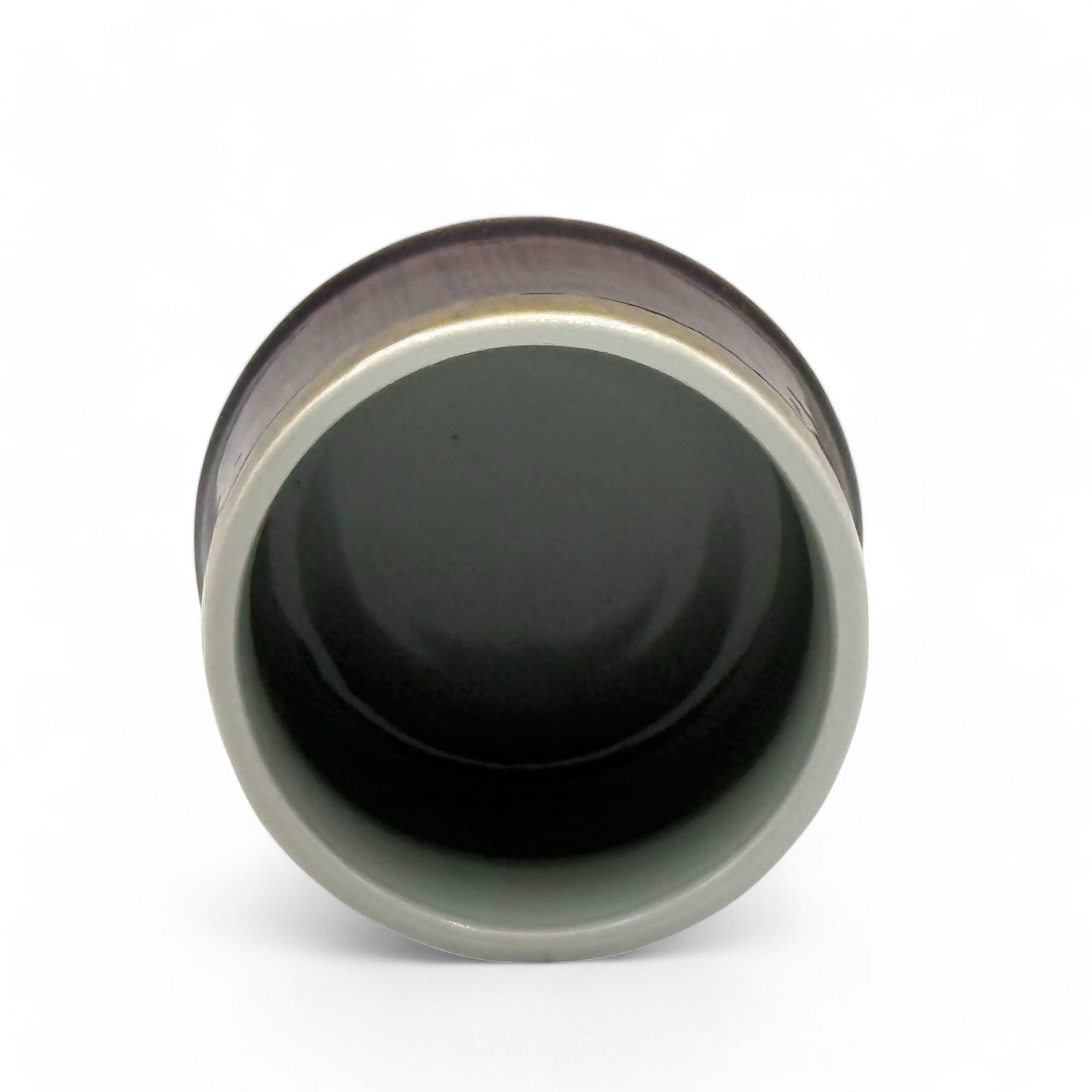 Handcrafted Mino-yaki Yunomi Japanese teacup with traditional glaze, perfect for daily tea rituals.