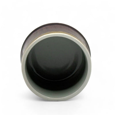 Handcrafted Mino-yaki Yunomi Japanese teacup with traditional glaze, perfect for daily tea rituals.