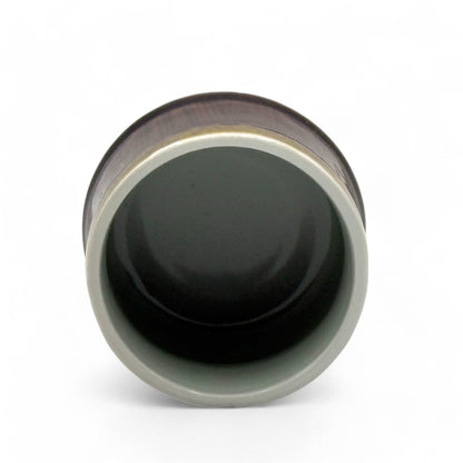 Handcrafted Mino-yaki Yunomi Japanese teacup with traditional glaze, perfect for daily tea rituals.