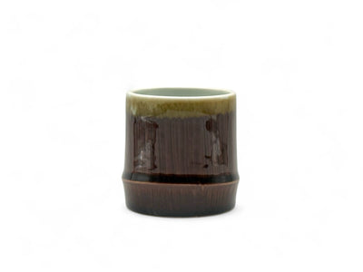 Handcrafted Mino-yaki Yunomi Japanese teacup with traditional glaze, perfect for daily tea rituals.