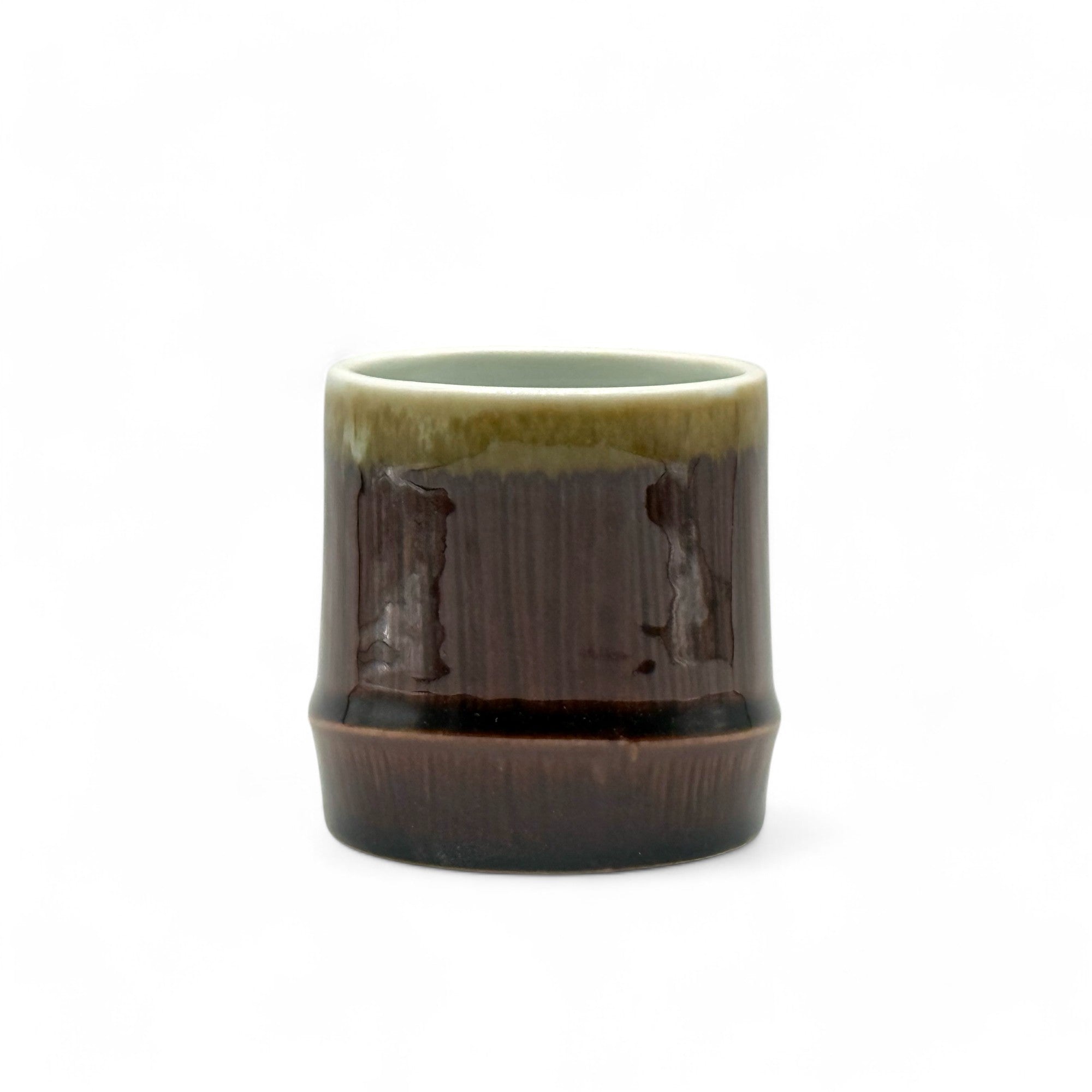 Handcrafted Mino-yaki Yunomi Japanese teacup with traditional glaze, perfect for daily tea rituals.