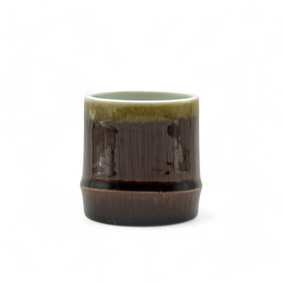 Handcrafted Mino-yaki Yunomi Japanese teacup with traditional glaze, perfect for daily tea rituals.
