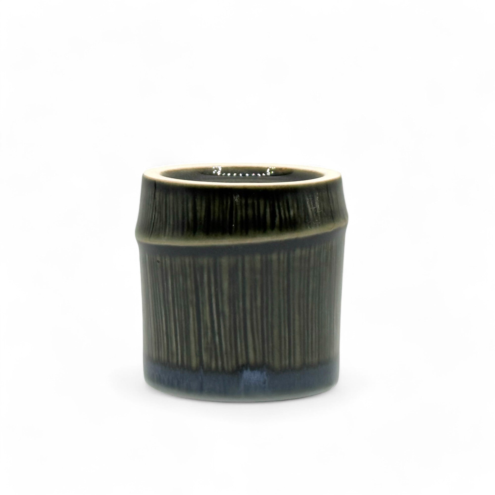 Handcrafted Mino-yaki Yunomi Japanese teacup with traditional glaze, perfect for daily tea rituals.