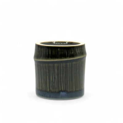 Handcrafted Mino-yaki Yunomi Japanese teacup with traditional glaze, perfect for daily tea rituals.