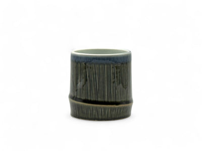 Handcrafted Mino-yaki Yunomi Japanese teacup with traditional glaze, perfect for daily tea rituals.