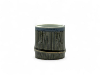 Handcrafted Mino-yaki Yunomi Japanese teacup with traditional glaze, perfect for daily tea rituals.