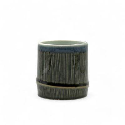 Handcrafted Mino-yaki Yunomi Japanese teacup with traditional glaze, perfect for daily tea rituals.