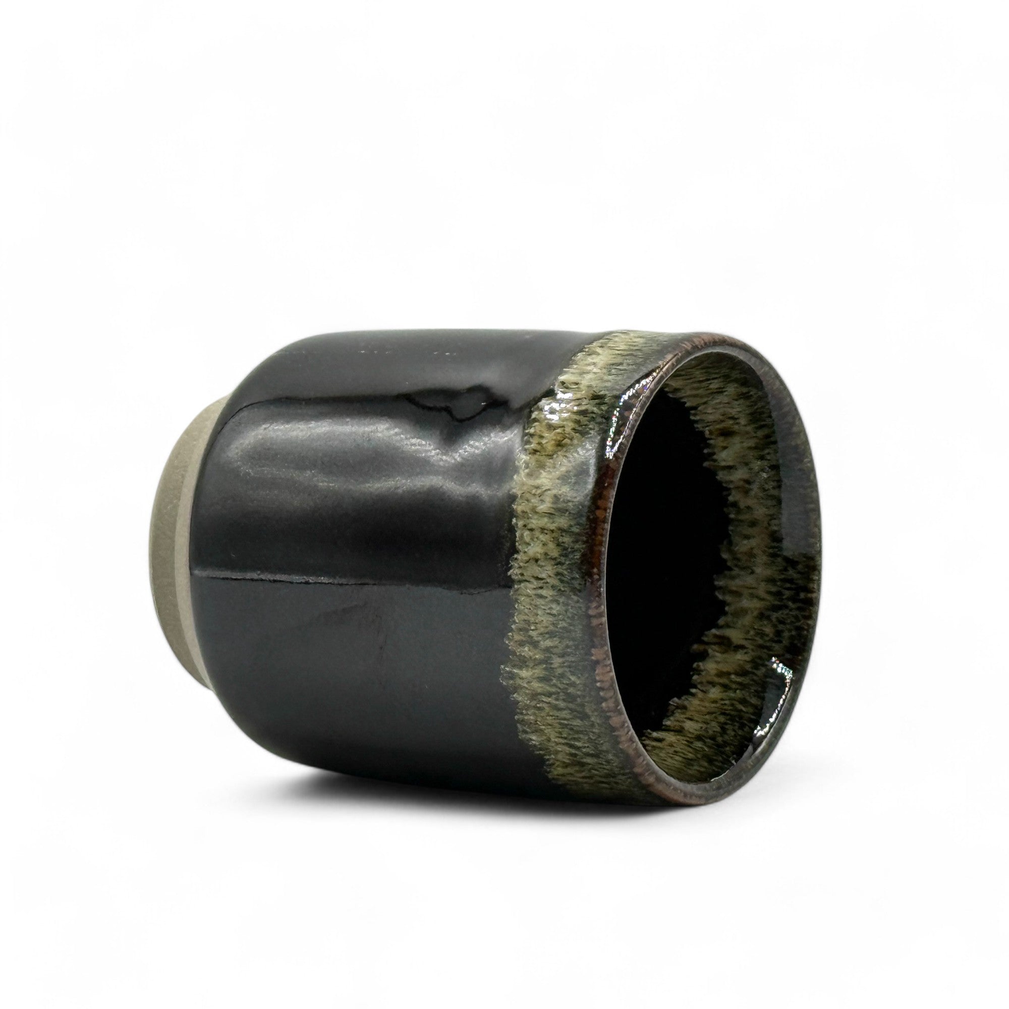 Handcrafted Mino-yaki Yunomi Japanese teacup with traditional glaze, perfect for daily tea rituals.