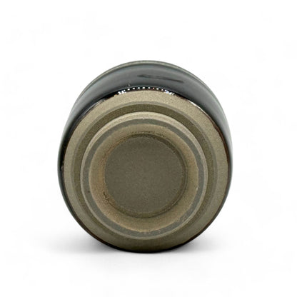 Handcrafted Mino-yaki Yunomi Japanese teacup with traditional glaze, perfect for daily tea rituals.