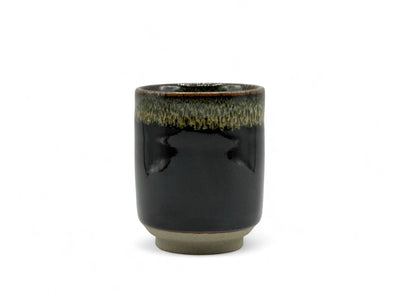 Handcrafted Mino-yaki Yunomi Japanese teacup with traditional glaze, perfect for daily tea rituals.