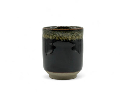 Handcrafted Mino-yaki Yunomi Japanese teacup with traditional glaze, perfect for daily tea rituals.