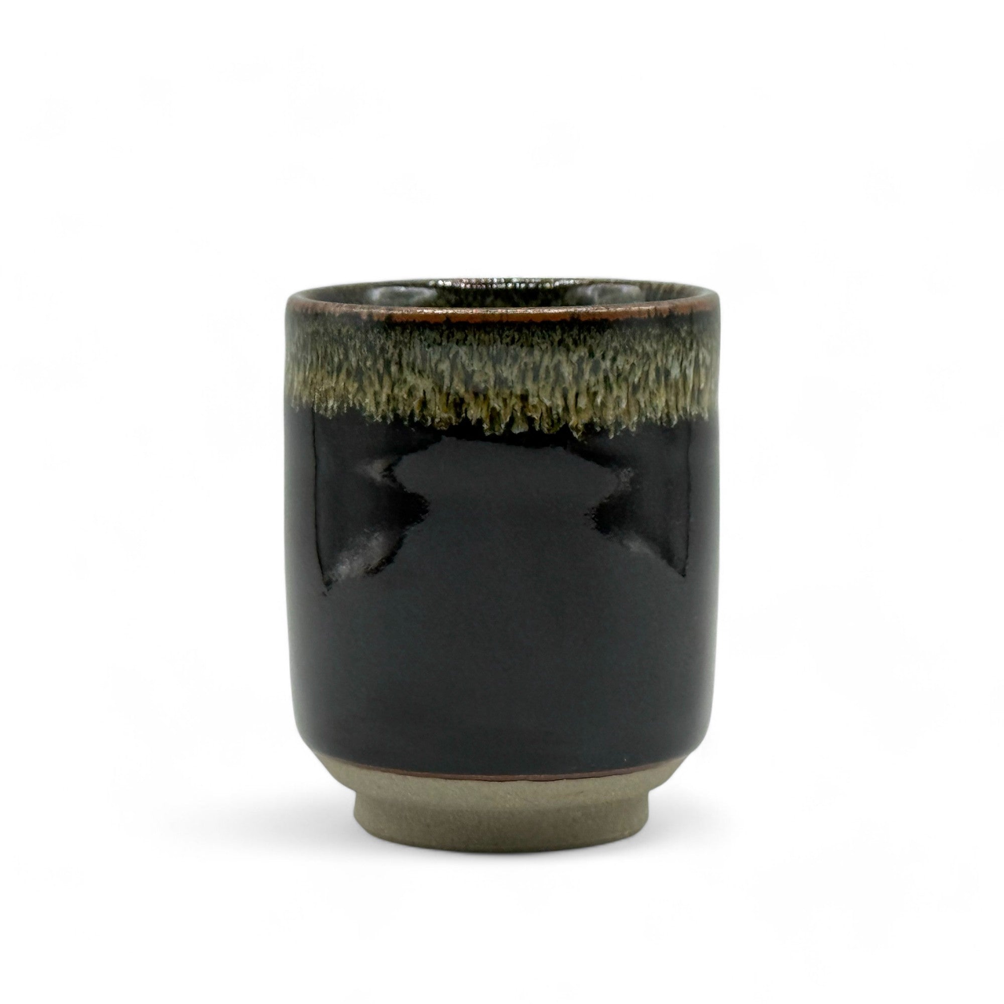 Handcrafted Mino-yaki Yunomi Japanese teacup with traditional glaze, perfect for daily tea rituals.