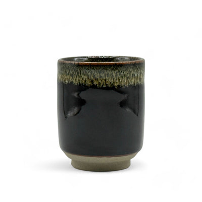 Handcrafted Mino-yaki Yunomi Japanese teacup with traditional glaze, perfect for daily tea rituals.