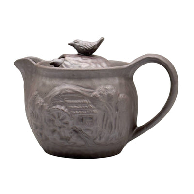 Handcrafted Tori Tobidashi Banko-yaki Kyusu Japanese teapot for authentic green tea brewing, featuring traditional side handle design.