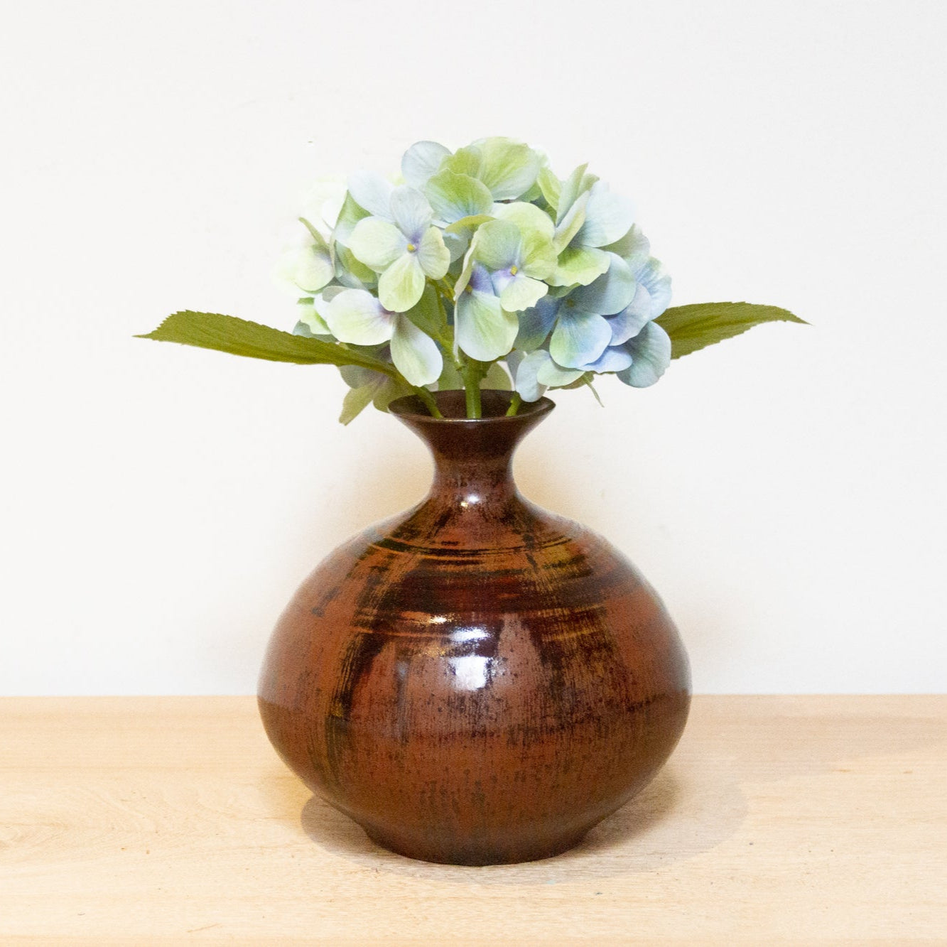 Vintage Japanese stoneware vase “Tsuchi,” handmade ceramic with wabi-sabi design and earthy tones for home decor.