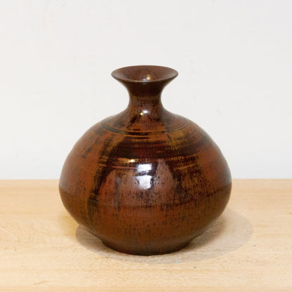 Vintage Japanese stoneware vase “Tsuchi,” handmade ceramic with wabi-sabi design and earthy tones for home decor.