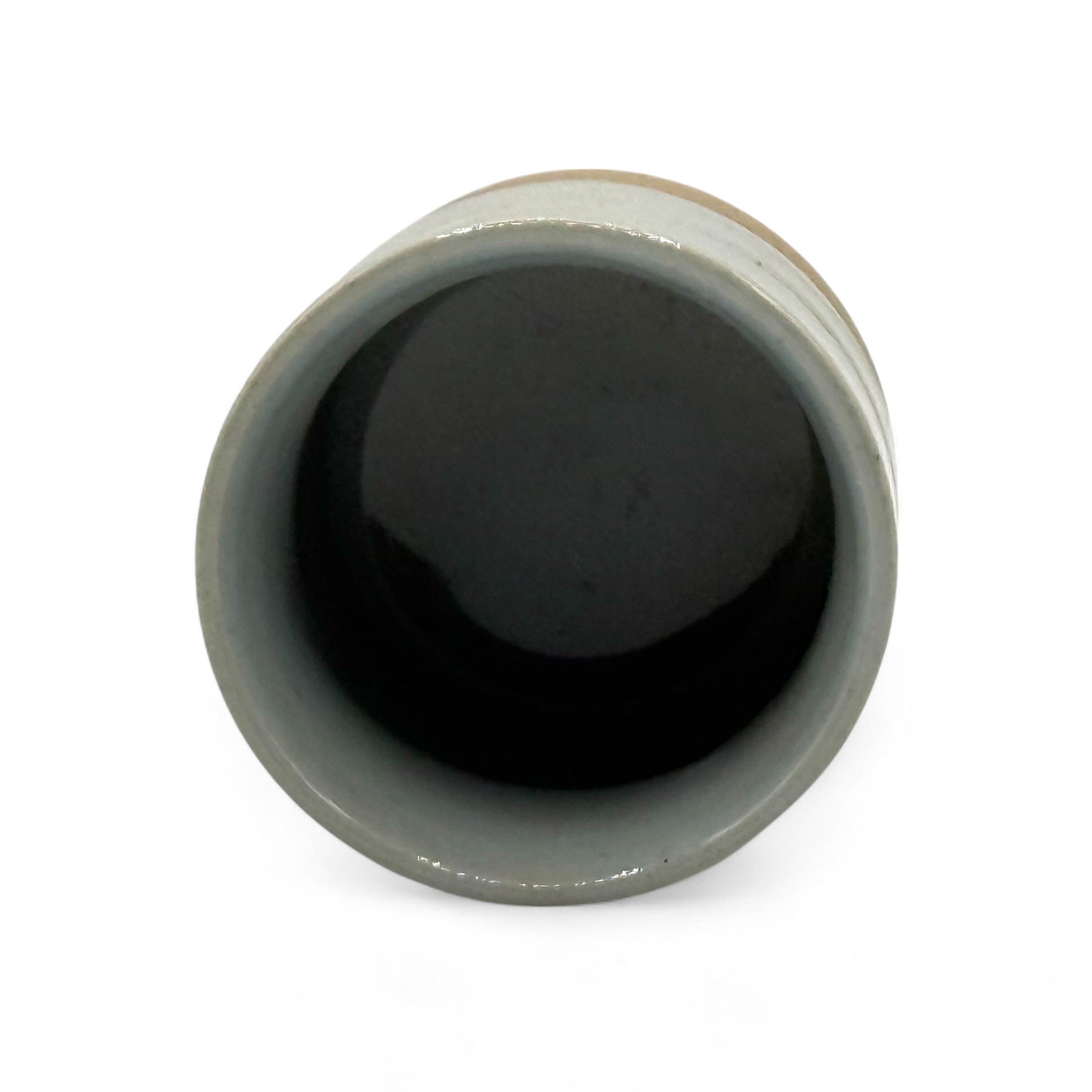 Handcrafted Mino-yaki Yunomi Japanese teacup with traditional glaze, perfect for daily tea rituals.