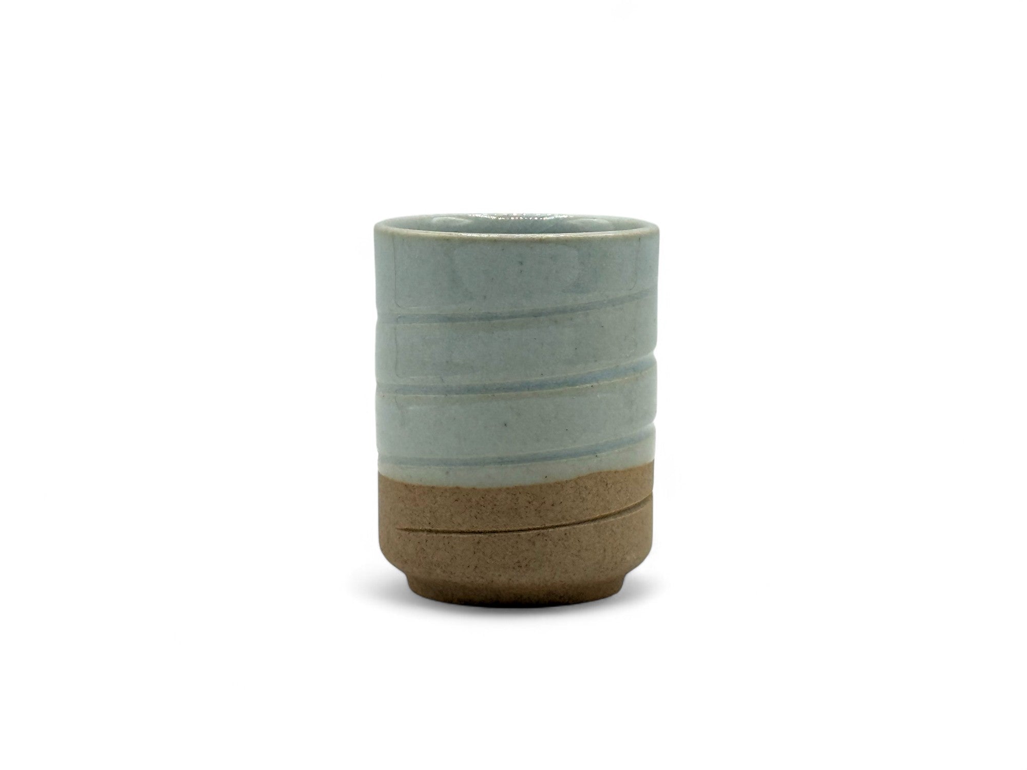 Handcrafted Mino-yaki Yunomi Japanese teacup with traditional glaze, perfect for daily tea rituals.