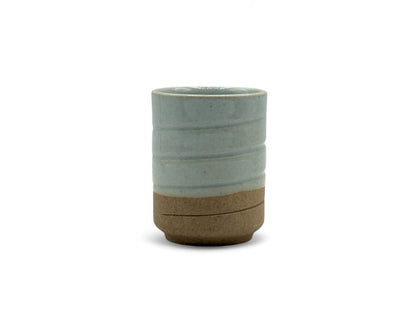 Handcrafted Mino-yaki Yunomi Japanese teacup with traditional glaze, perfect for daily tea rituals.