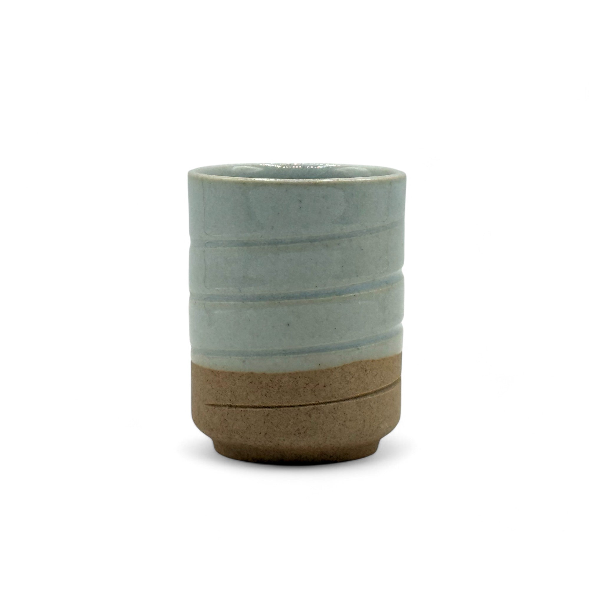 Handcrafted Mino-yaki Yunomi Japanese teacup with traditional glaze, perfect for daily tea rituals.