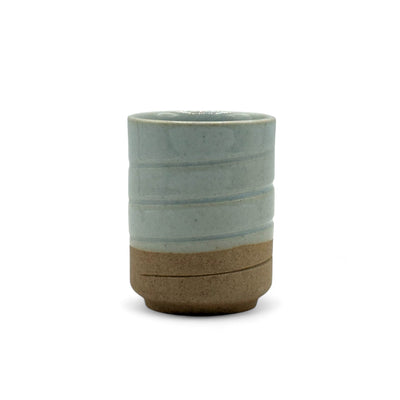 Handcrafted Mino-yaki Yunomi Japanese teacup with traditional glaze, perfect for daily tea rituals.