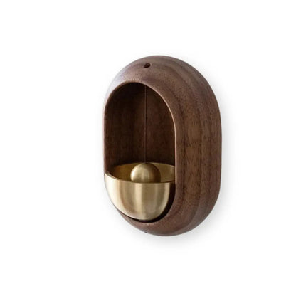 Japanese wooden doorbell with traditional design, handcrafted for a stylish and functional addition to home entrance decor.