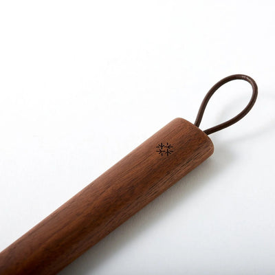 Yuhuro Japanese comfy shoehorn for easy, ergonomic slip-on shoes, designed for comfort and effortless use.